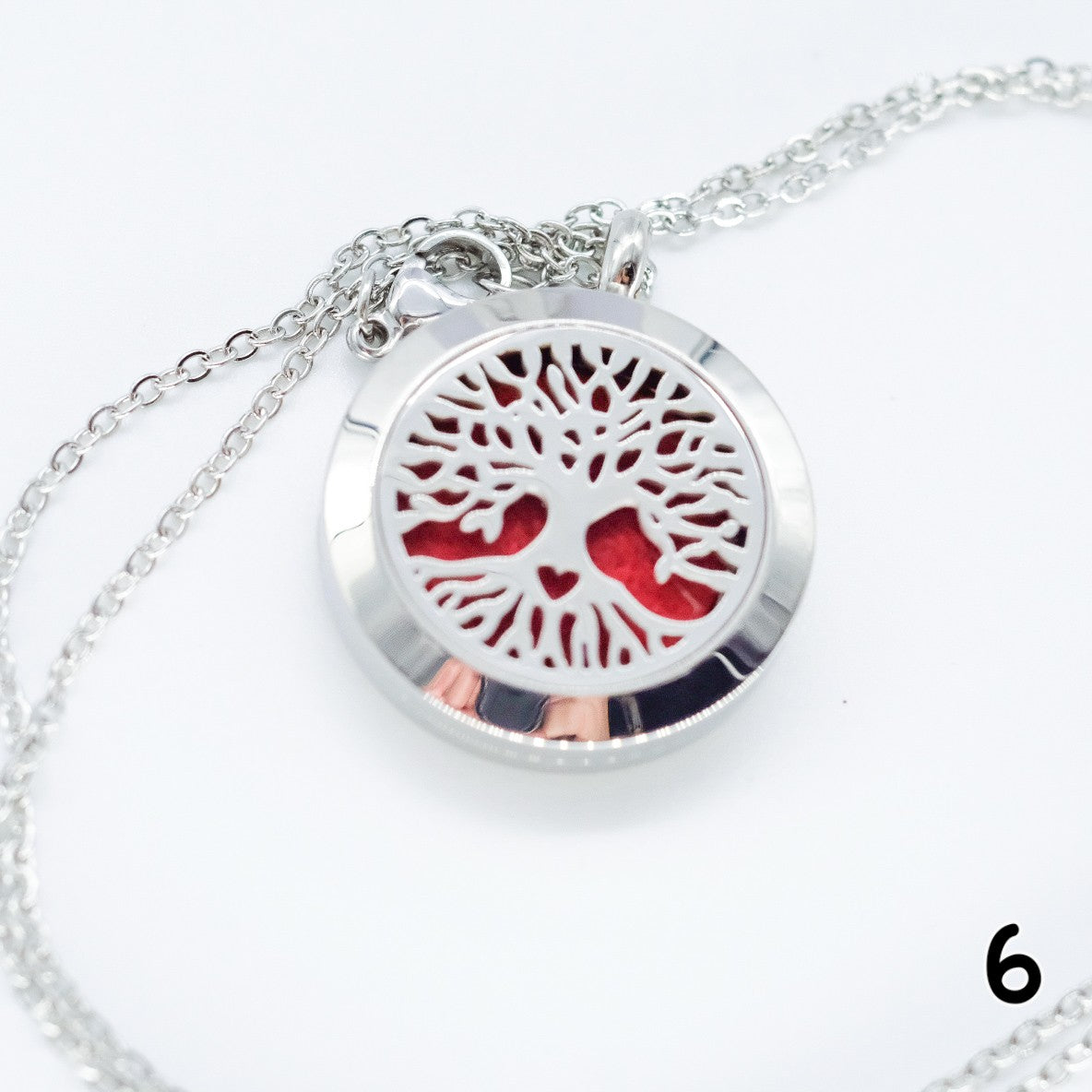 Collier d'aromathérapie rond en acier inoxydable