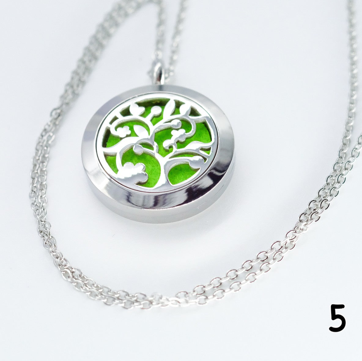 Collier d'aromathérapie rond en acier inoxydable