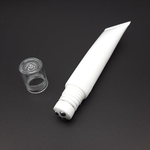 Tube vide avec boule de massage