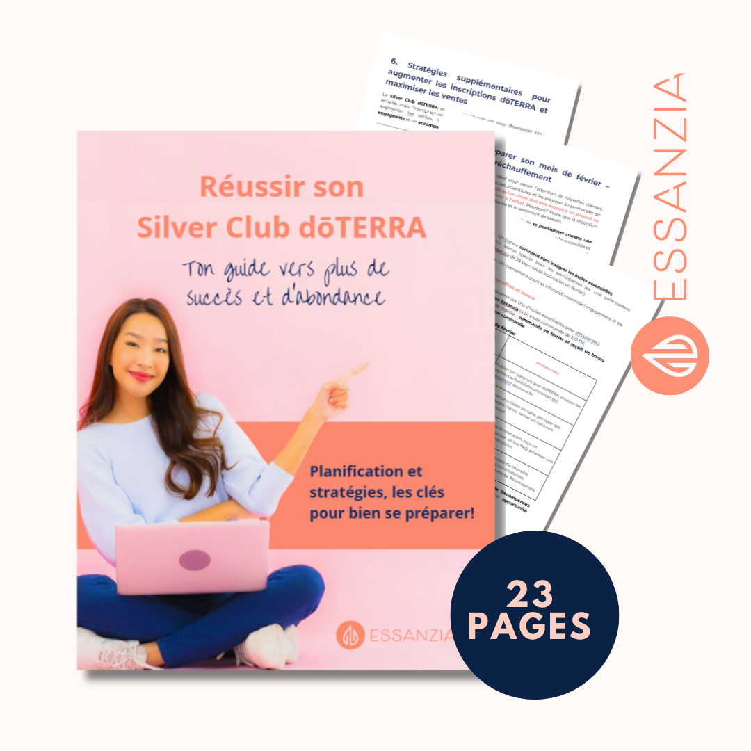 Guide numérique intitulé 'Réussir son Silver Club doTERRA' proposé par Essanzia. La couverture présente une femme souriante avec un ordinateur portable, sur un fond rose, pointant vers le titre du guide. En arrière-plan, quelques pages du guide sont visibles. Indique que le guide contient 23 pages.
