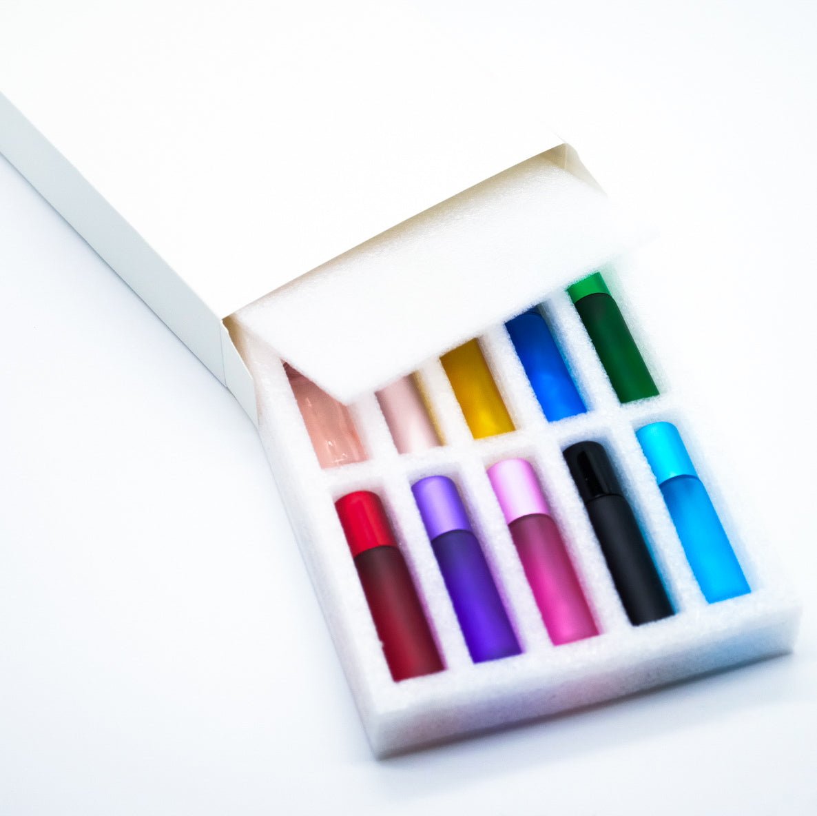 Box of 10 Bottles with roll-on applicator - 10 different colors - 10 ml