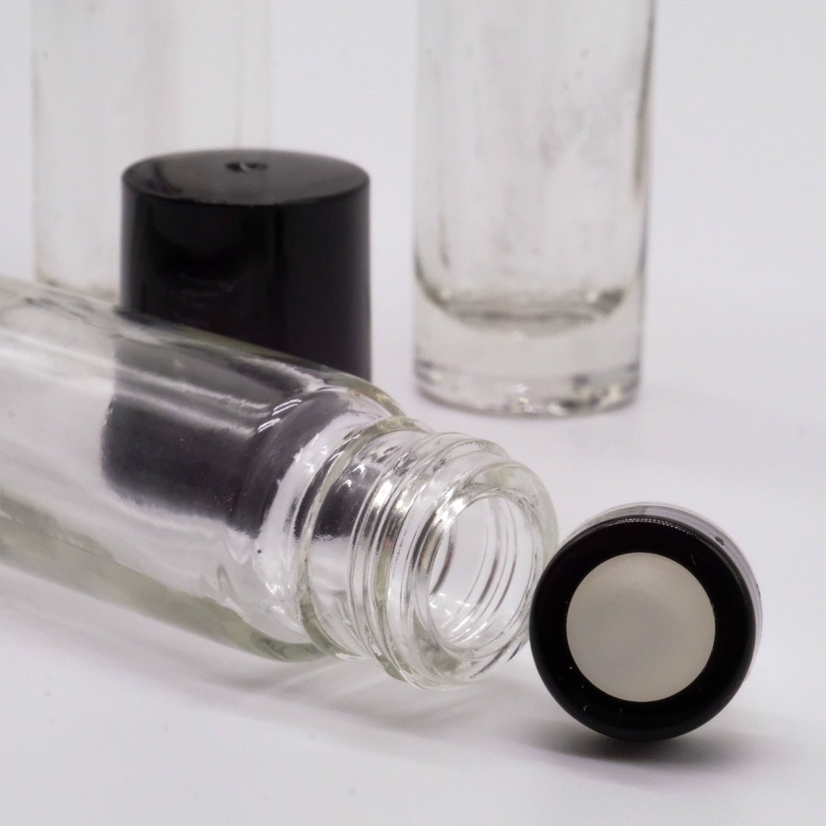 Bouteille avec applicateur à bille – Transparent et Bouchon noir