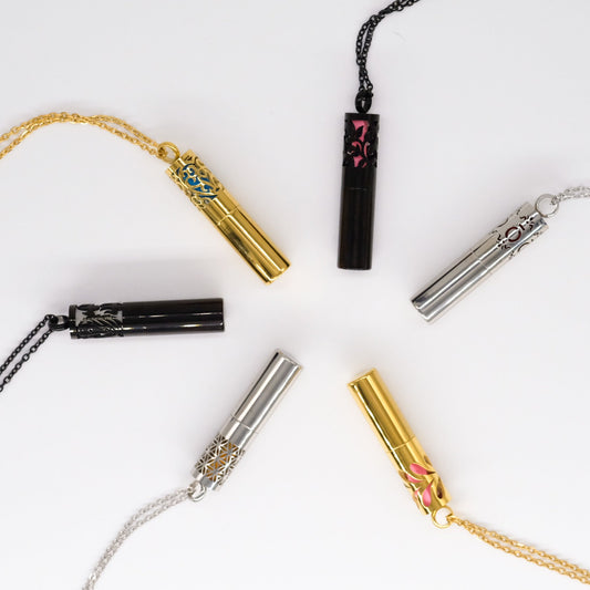 Collier d'aromathérapie cylindrique avec conteneur en acier inoxydable