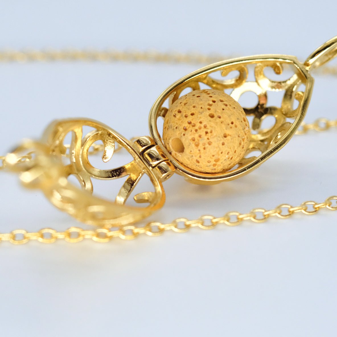 Collier d'aromathérapie goutte d'eau en acier inoxydable et pierre de lave