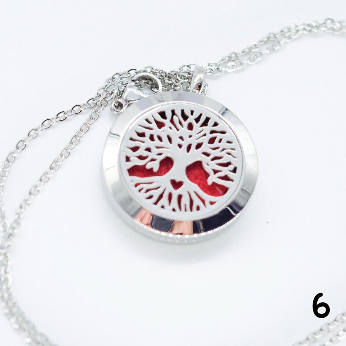 Collier d'aromathérapie rond en acier inoxydable