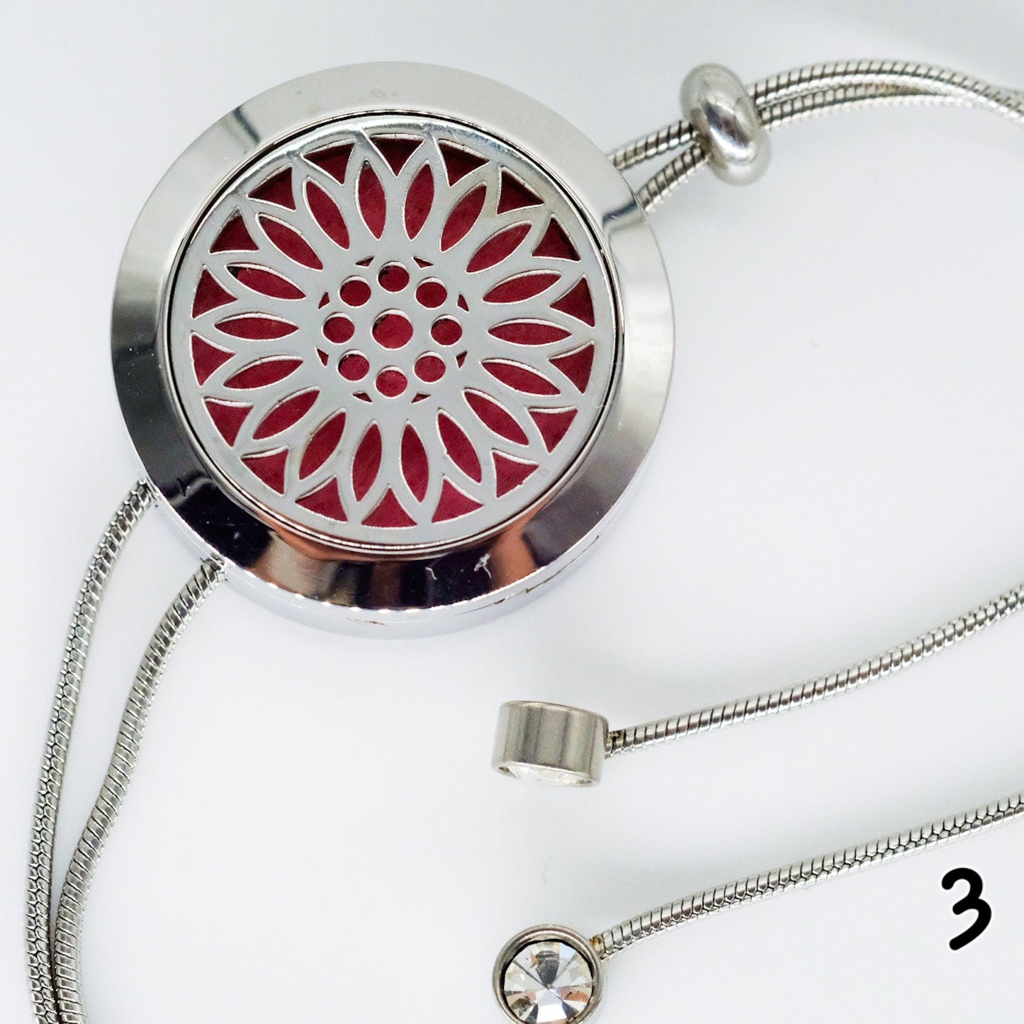 Collier d'aromathérapie rond en acier inoxydable avec une chaîne longue