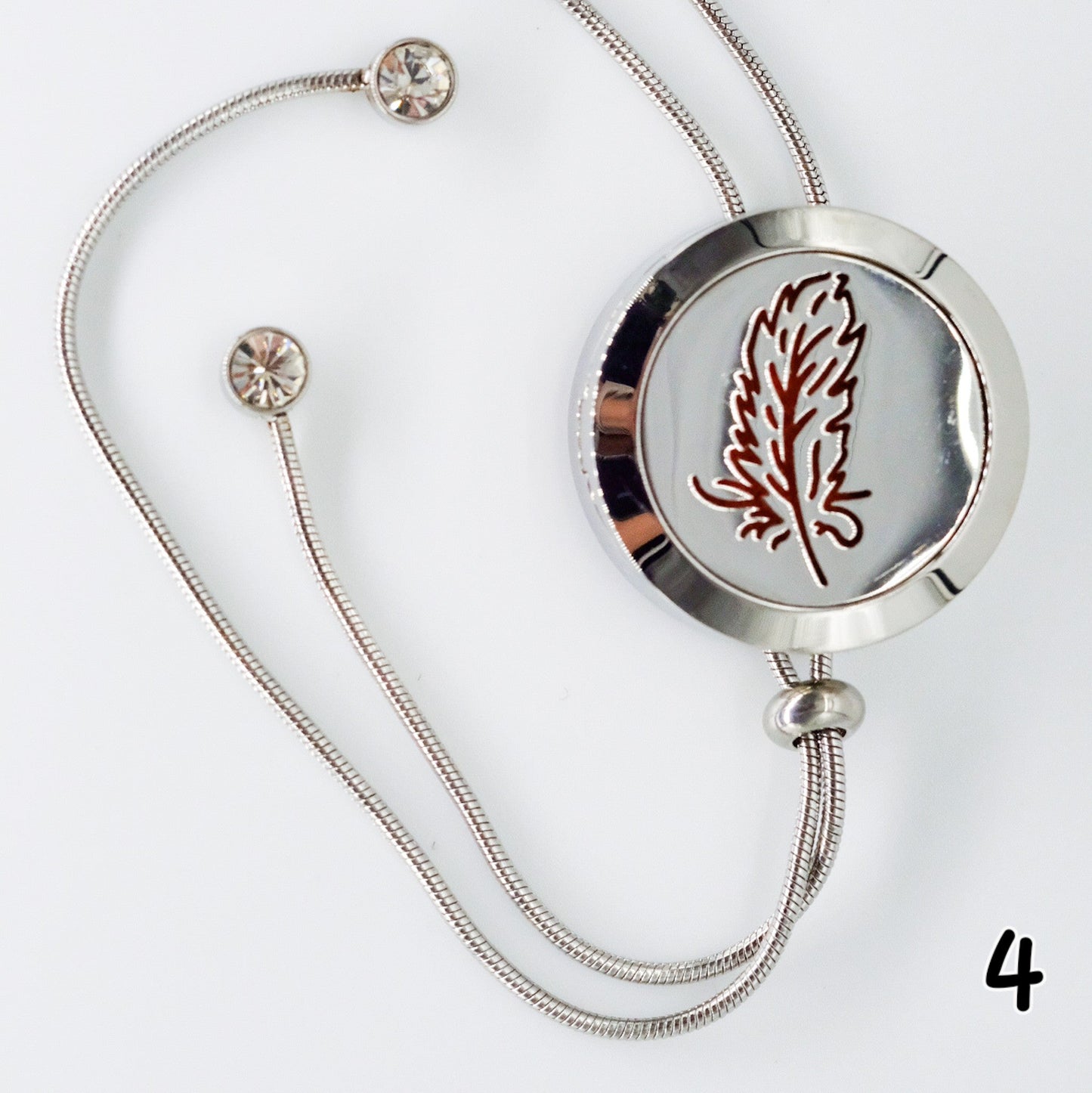 Collier d'aromathérapie rond en acier inoxydable avec une chaîne longue