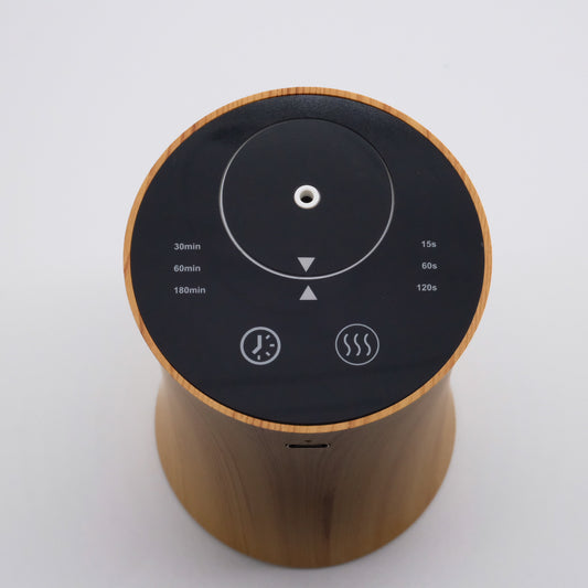 Nébulisateur finition bois, vue du dessus, panneau noir avec minuteur 30/60/180 min et cycles 15/60/120 s
