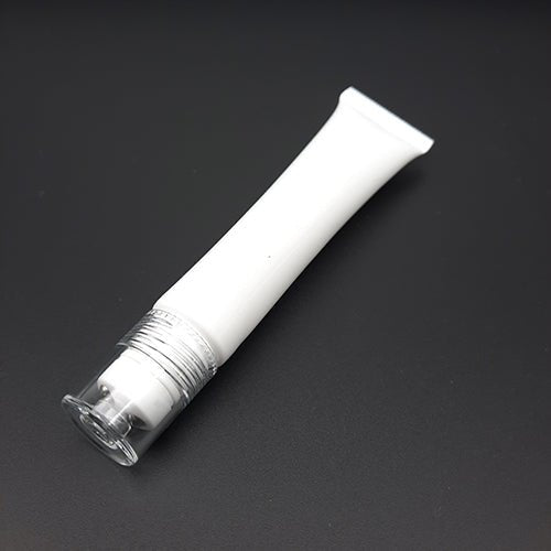Empty tube with massage ball